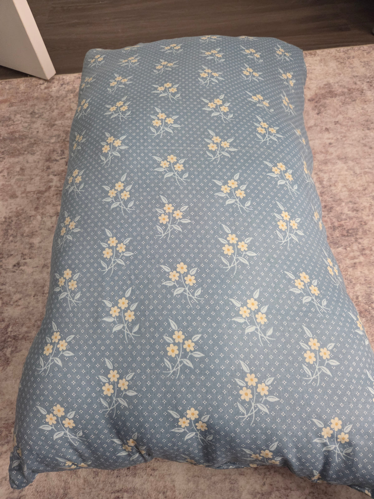 Blue floral lounge pillow