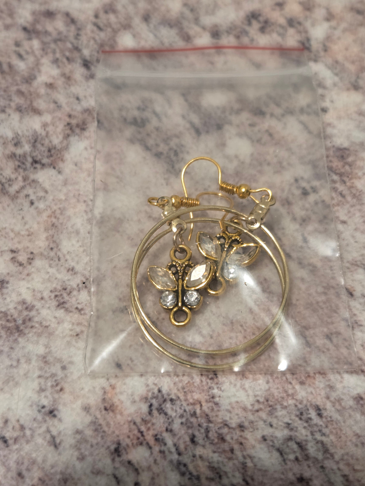 Golden butterfly earrings