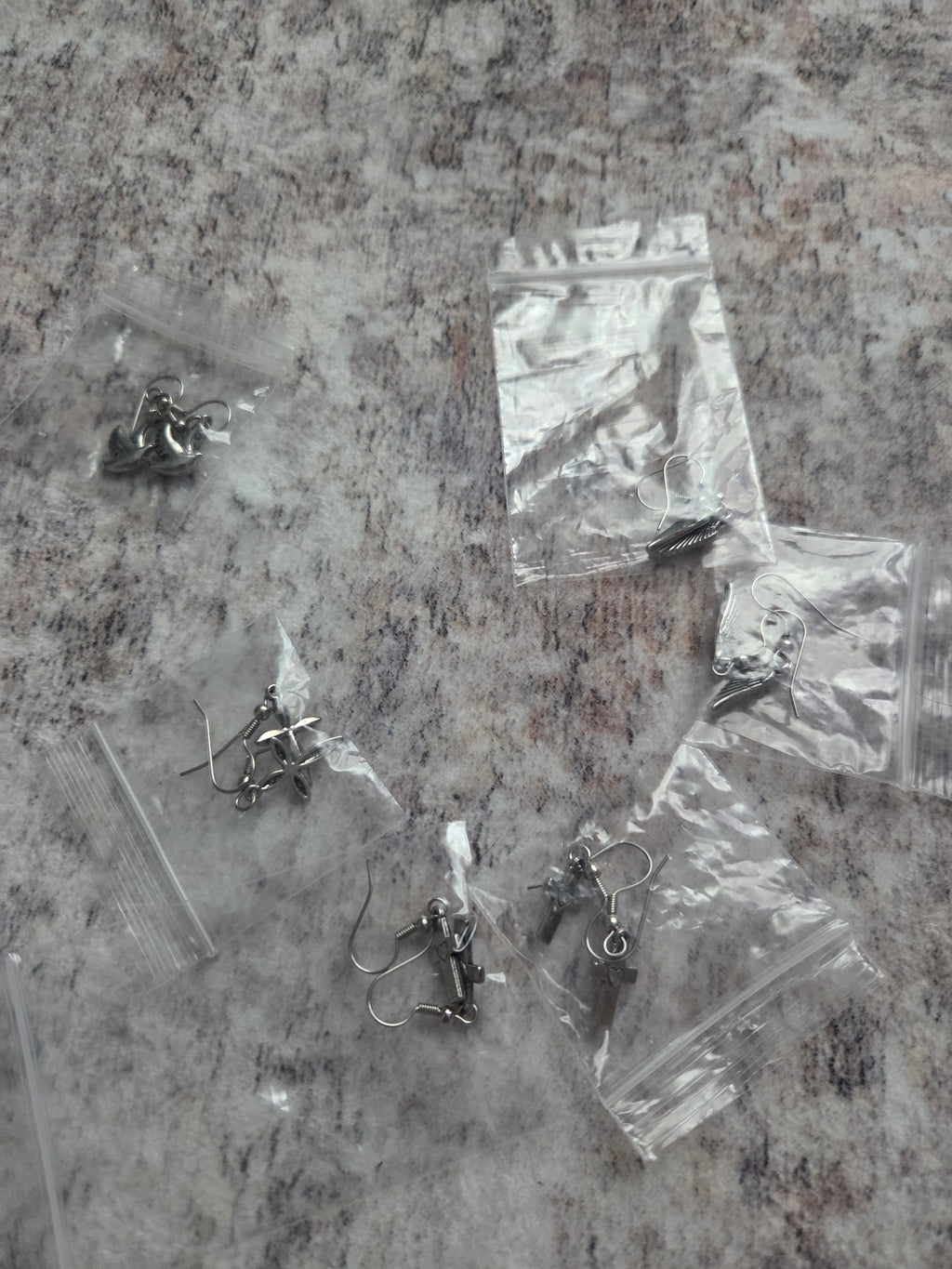 Religious themed earrings