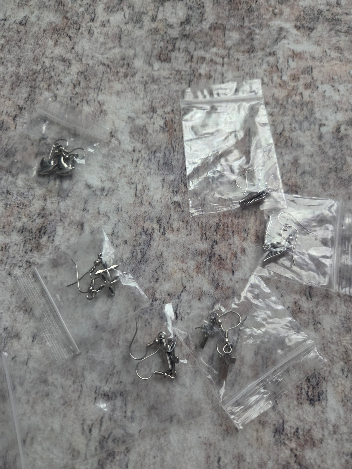 Religious themed earrings