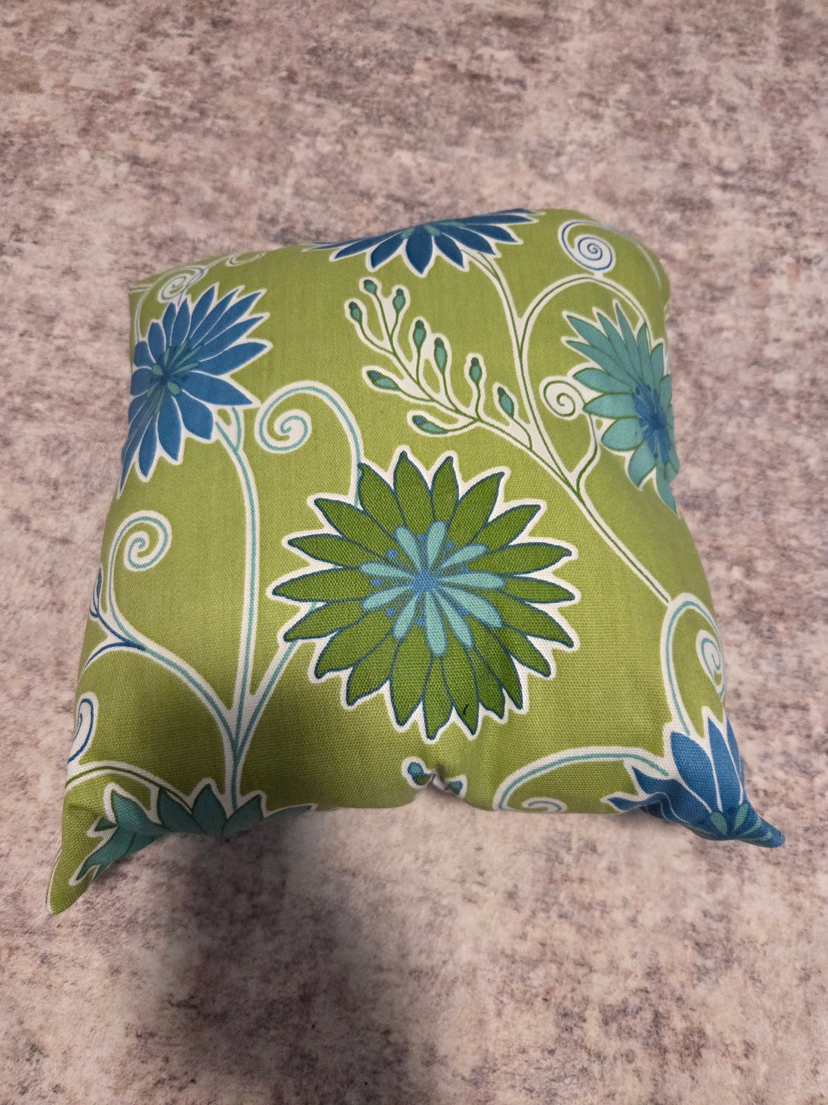 Small green floral throw pillow