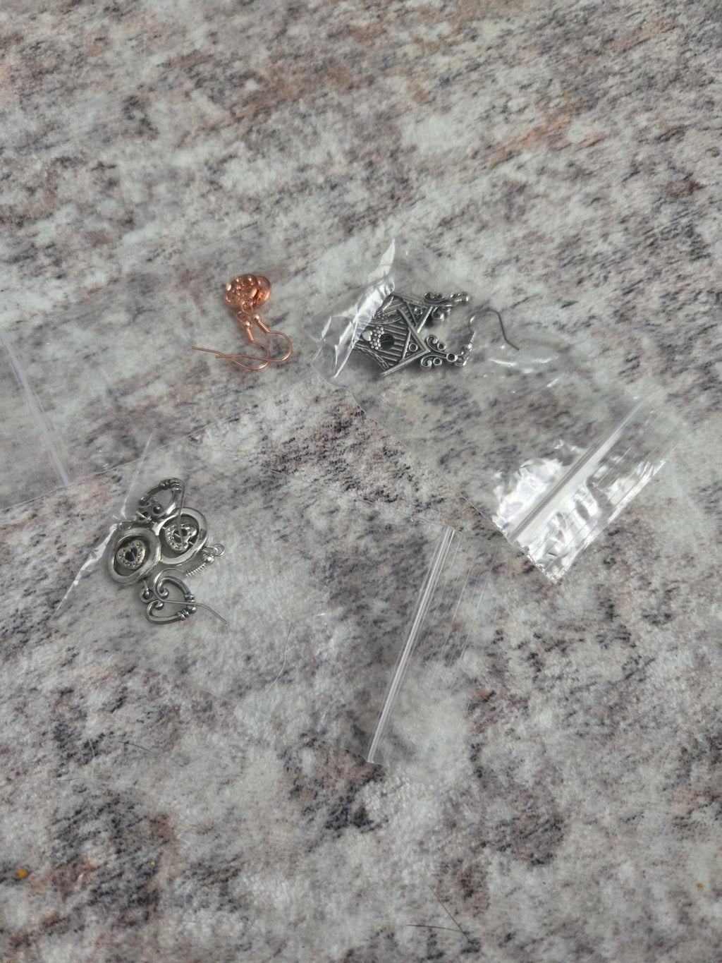 Charm style earrings