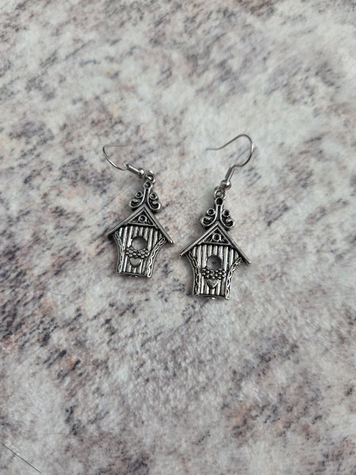 Charm style earrings
