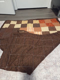 Brown patchwork quilt
