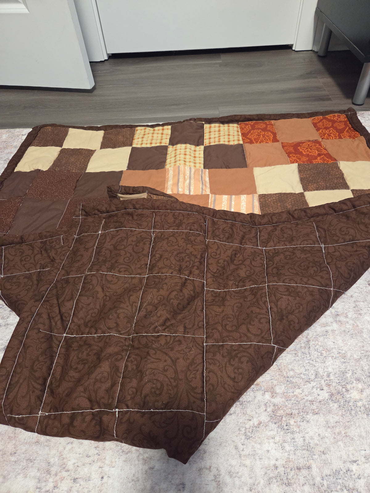 Brown patchwork quilt