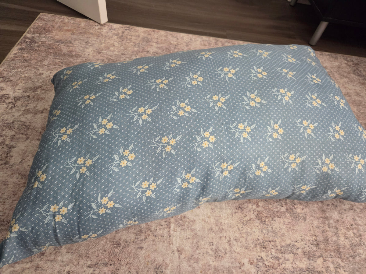 Blue floral lounge pillow