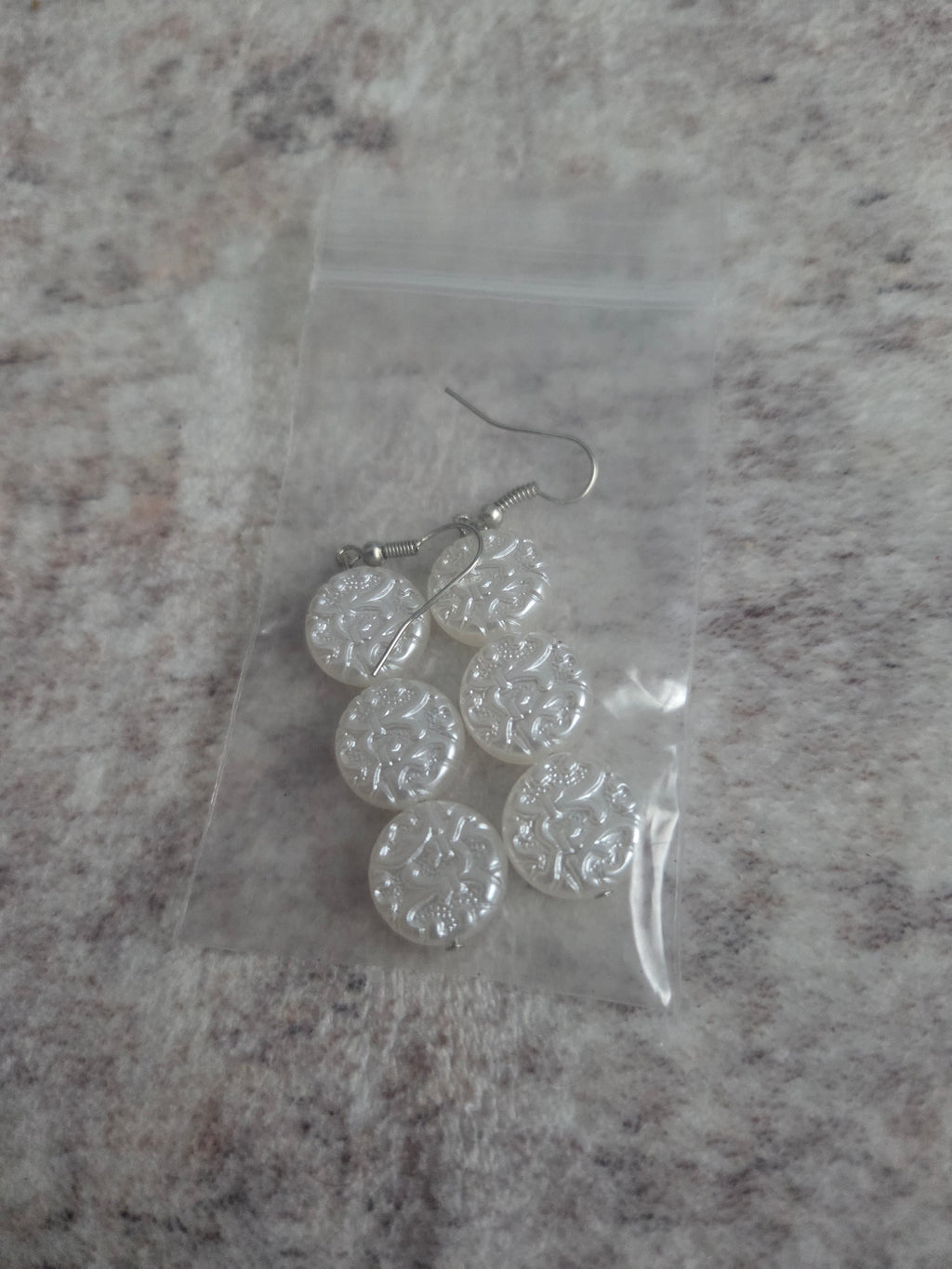 Pearlescent white beaded earrings