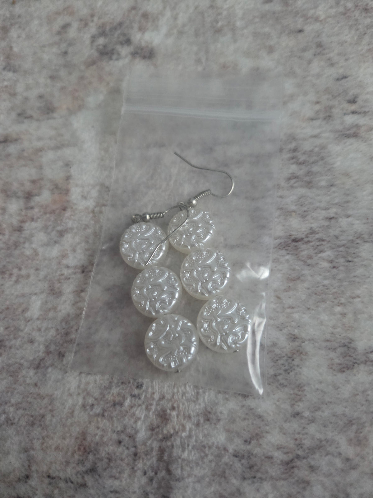 Pearlescent white beaded earrings